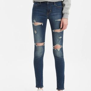 710 SUPER SKINNY RIPPED Mid Rise JEANS
